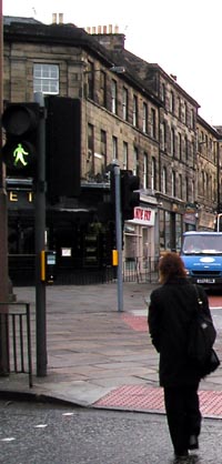 Woman on pedestrian crossing.