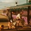 Cyclists board sleeper train.