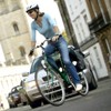 Woman cycling.